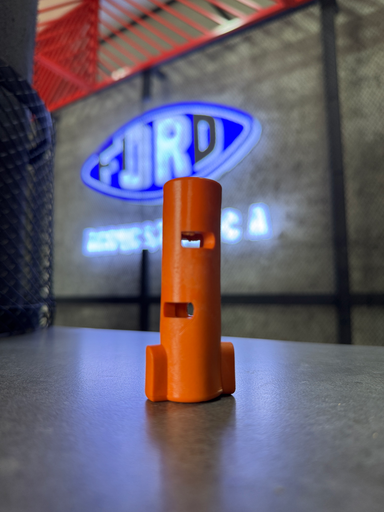 [81DB-5L393-AD] CERRADURA  NARANJA  TUMBAR CABINA  C-815/1721